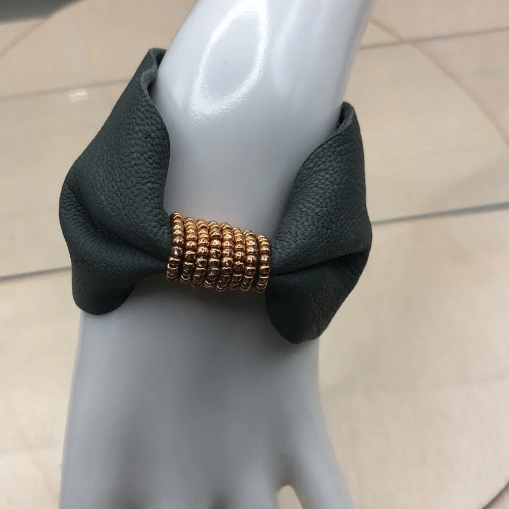 Soft leather bow shaped bracelet.